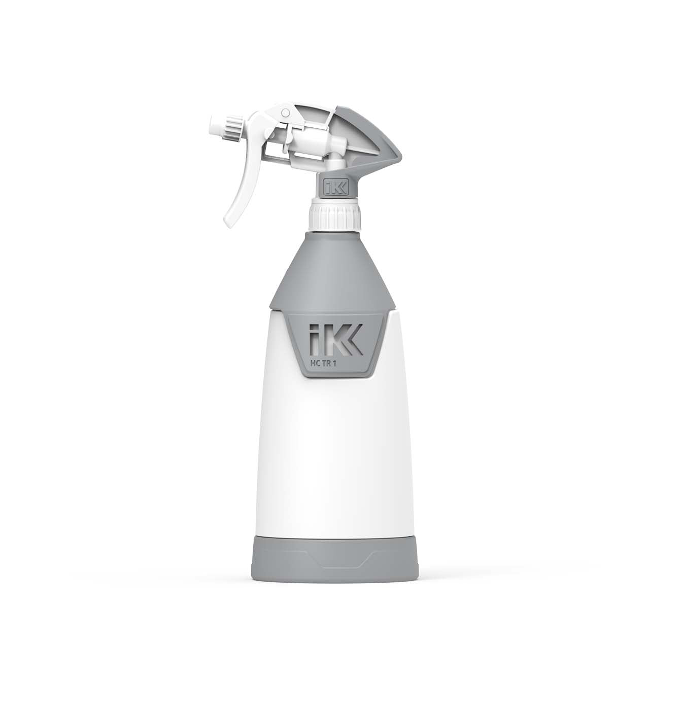 Studio shot of an iK HC TR 1 manual trigger spray bottle featuring a white cylindrical body, grey trigger mechanism, and grey base with the iK logo and model name visible on its side