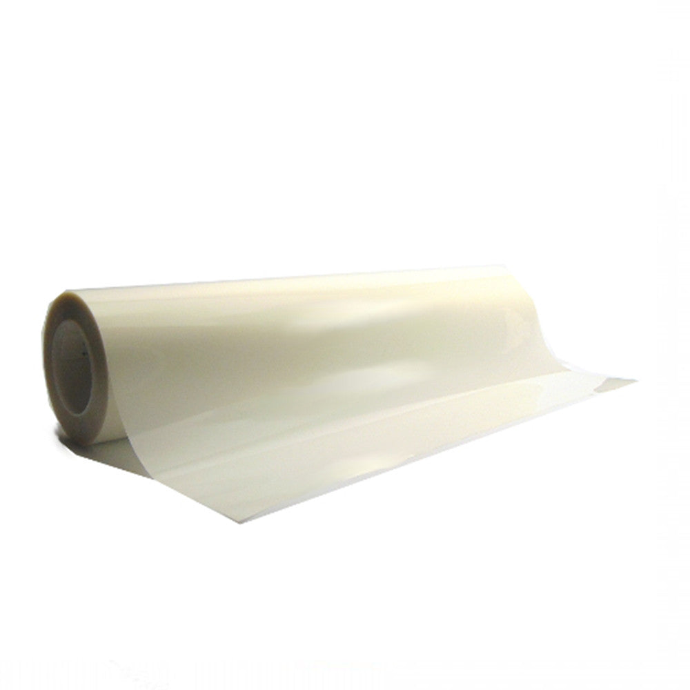 A roll of translucent off-white film with a subtle sheen partially unwound on a white studio background revealing its light brown core